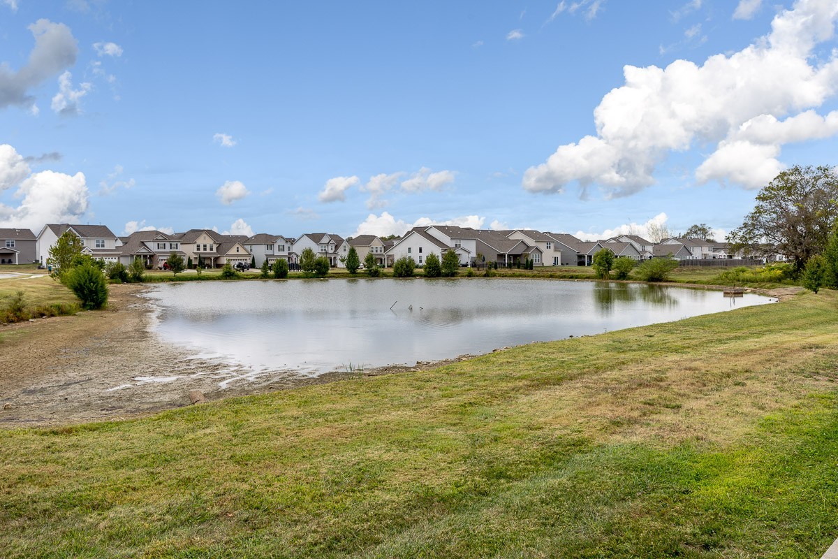 717 Mickelson Way Lebanon, TN 37087 - Photo 28 of 28 a view of a lake with houses in the background