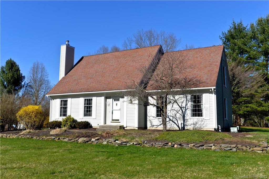 7 Windwood Road Brookfield, CT 06804 - Photo 1 of 1 a front view of a house with a garden