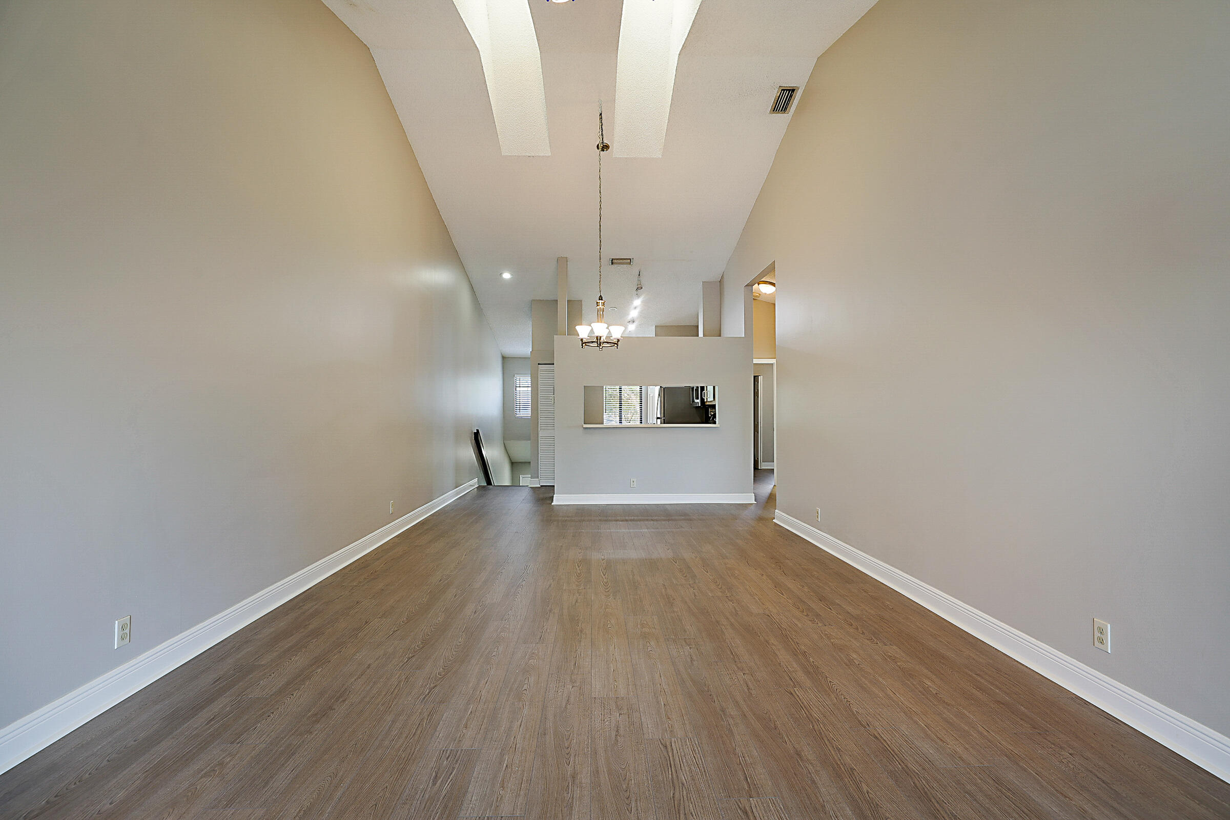 605 Harbour Pointe Way Greenacres, FL 33413 - Photo 14 of 48 a view of a room with wooden floor