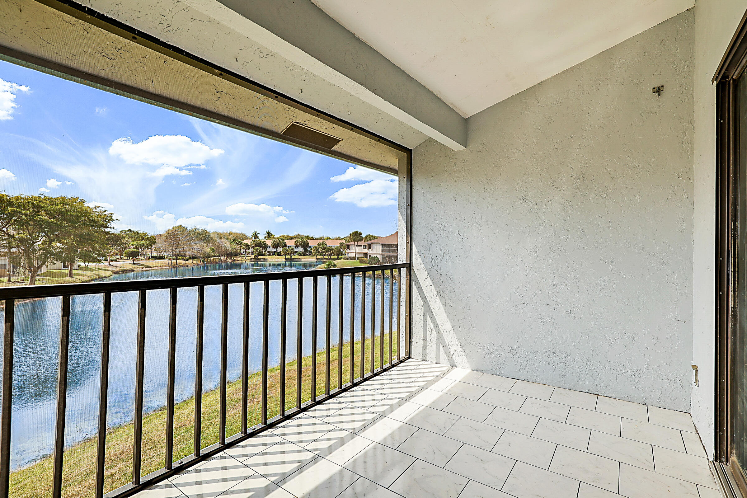605 Harbour Pointe Way Greenacres, FL 33413 - Photo 28 of 48 a view of balcony with furniture