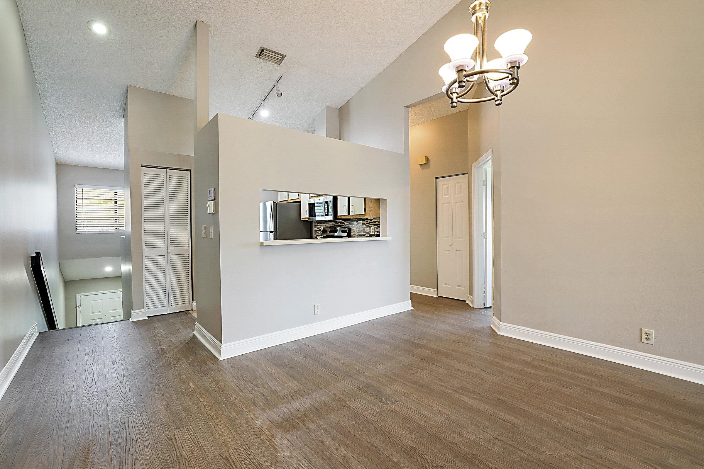 605 Harbour Pointe Way Greenacres, FL 33413 - Photo 30 of 48 wooden floor in an empty room with a window