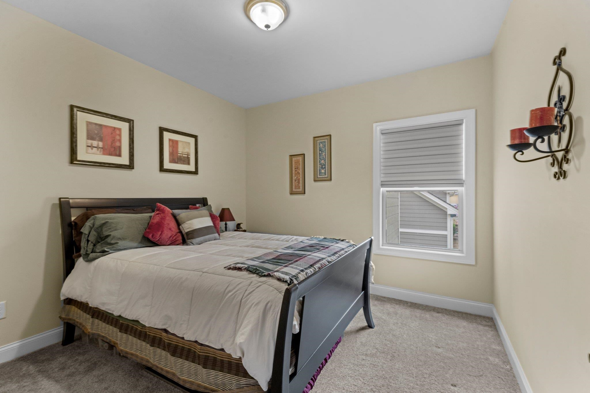 1545 Fullerton Place Raleigh, NC 27607 - Photo 23 of 45 Bedroom 2 on upper level with single window and standard closet. Bedroom 2