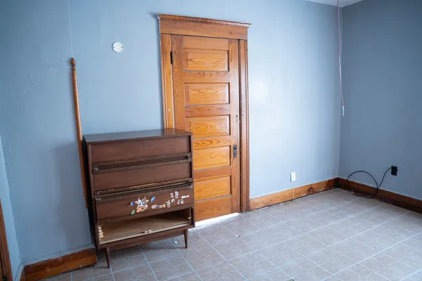 a view of an empty room and window