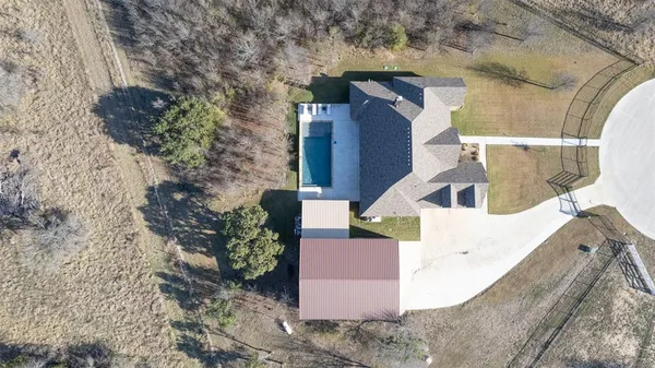 front view of a house with a trees