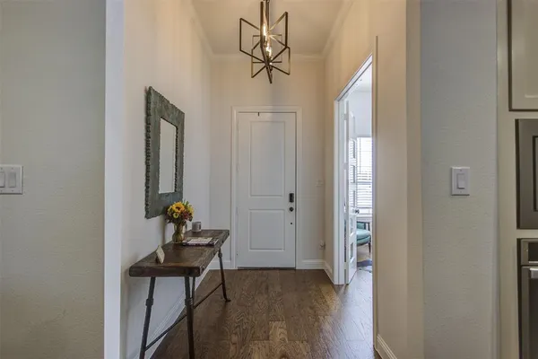 a view of entryway with wooden floor
