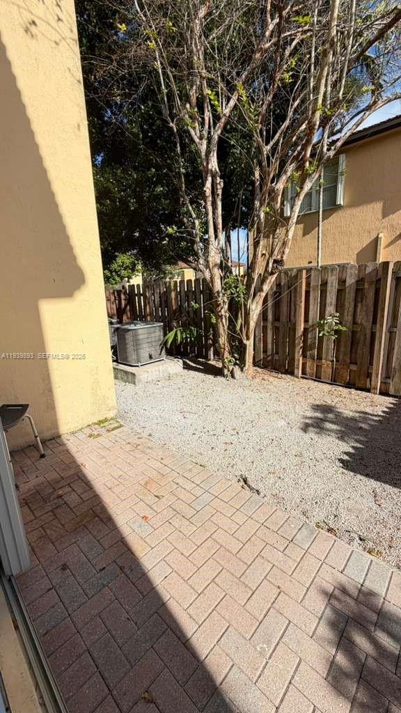 1555 Northeast 33rd Road, Unit 1012 Homestead, FL 33033 - Photo 16 of 54 a view of snow on the road