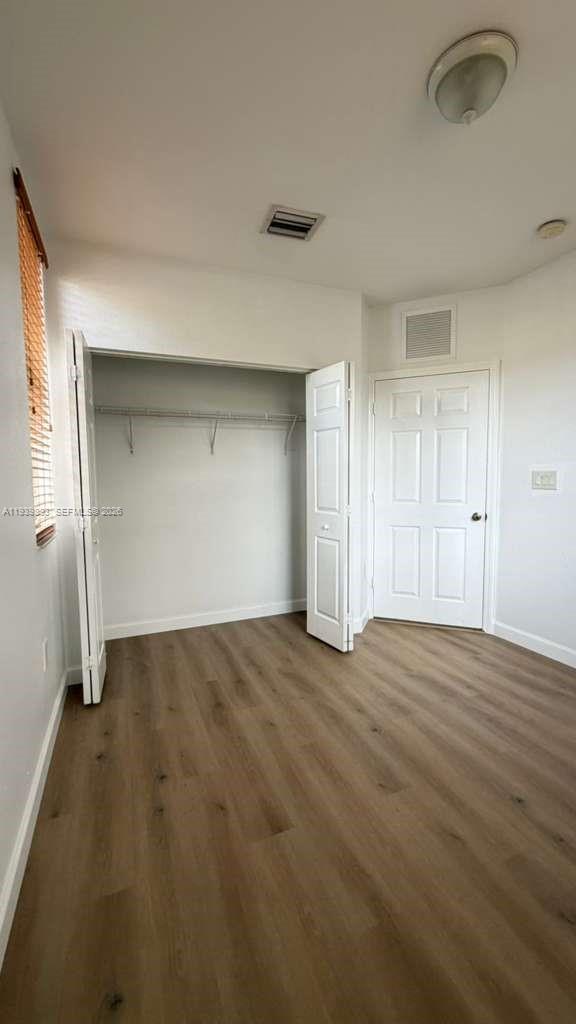 1555 Northeast 33rd Road, Unit 1012 Homestead, FL 33033 - Photo 39 of 54 a view of an empty room and window