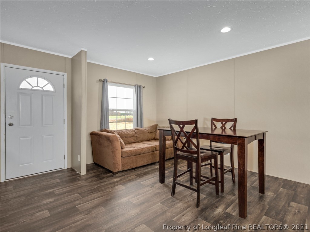 753 Mitchell Loop Road Roseboro, NC 28382 - Photo 6 of 30 a living room with furniture and a wooden floor