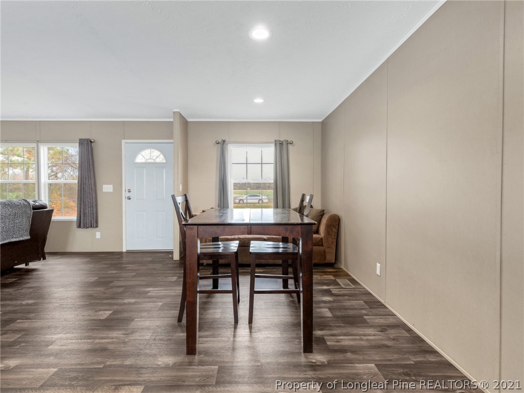 753 Mitchell Loop Road Roseboro, NC 28382 - Photo 8 of 30 a view of a dining room with furniture