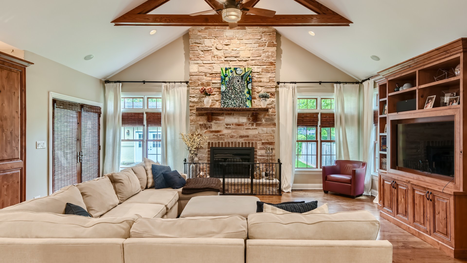 820 Hansen Place Park Ridge, IL 60068 - Photo 14 of 38 a living room with furniture a flat screen tv and a fireplace
