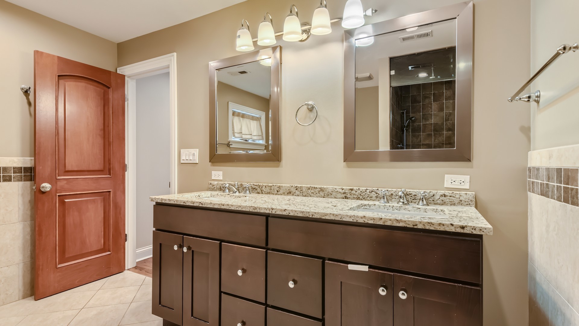 820 Hansen Place Park Ridge, IL 60068 - Photo 22 of 38 a bathroom with a sink and a mirror