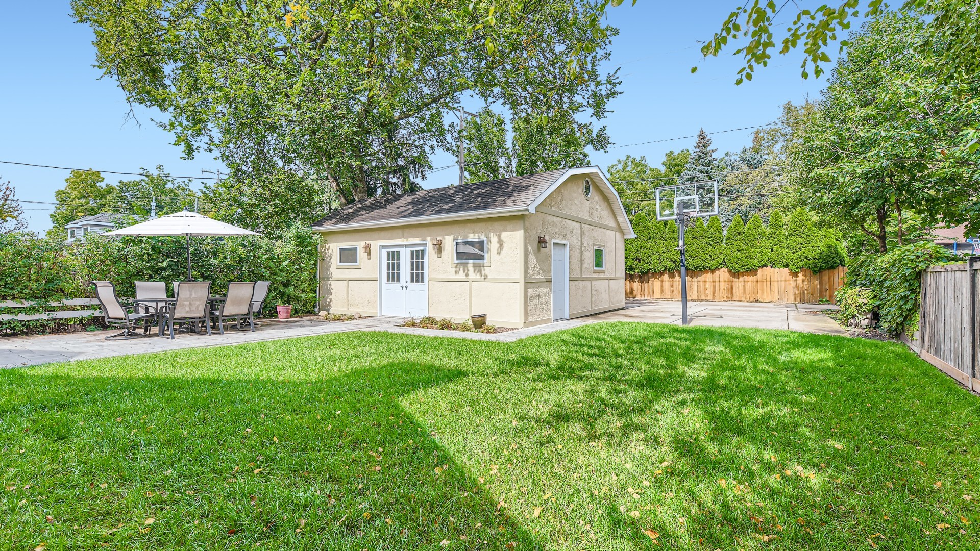 820 Hansen Place Park Ridge, IL 60068 - Photo 32 of 38 a view of a house with backyard sitting area and garden