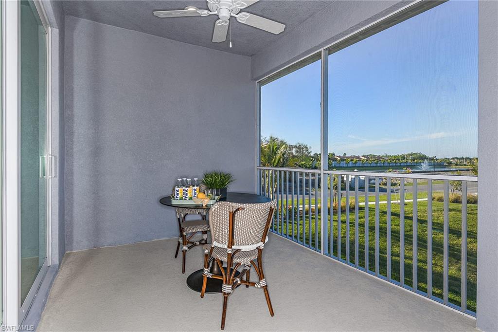 2621 Seychelles Circle, Unit 1806 Naples, FL 34112 - Photo 17 of 25 a view of a balcony with furniture
