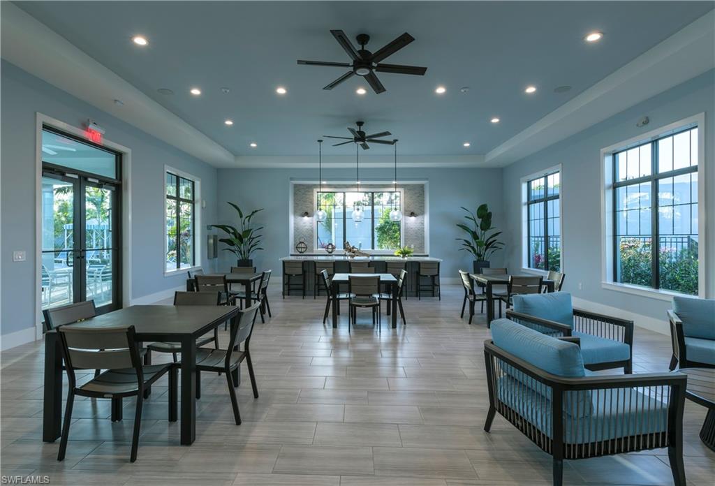 2621 Seychelles Circle, Unit 1806 Naples, FL 34112 - Photo 25 of 25 a view of a dining room with furniture window and outside view
