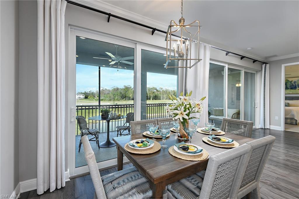 2621 Seychelles Circle, Unit 1806 Naples, FL 34112 - Photo 9 of 25 a view of a dining room with furniture window and outside view