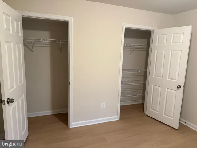 a view of a livingroom with a refrigerator