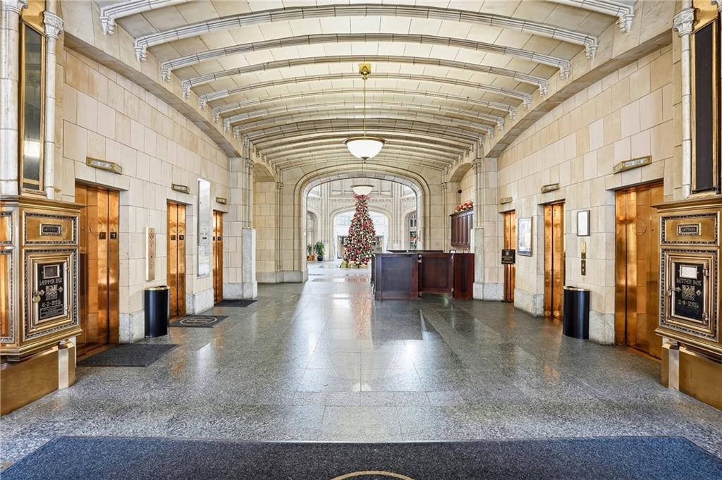 57 Forsyth Street Northwest, Unit 5D Atlanta, GA 30303 - Photo 2 of 28 a view of a hallway with wooden floors