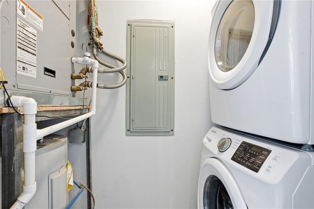 57 Forsyth Street Northwest, Unit 5D Atlanta, GA 30303 - Photo 21 of 28 a utility room with dryer and washer