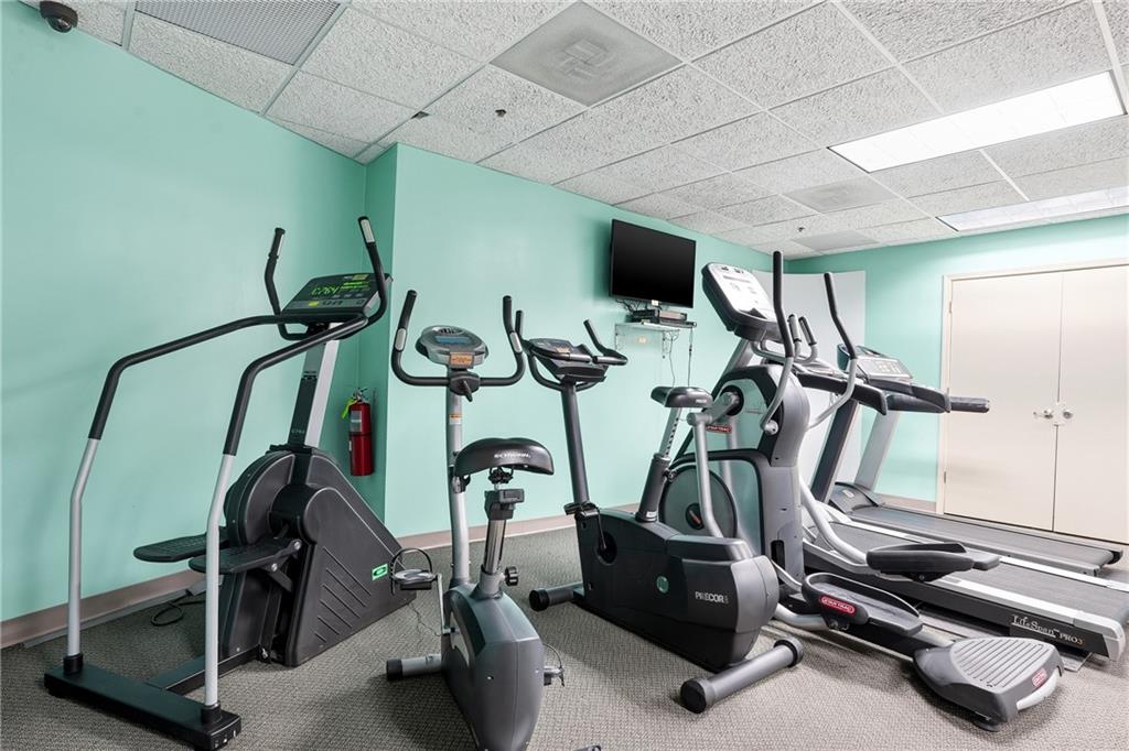 57 Forsyth Street Northwest, Unit 5D Atlanta, GA 30303 - Photo 6 of 28 a view of a room with gym equipment