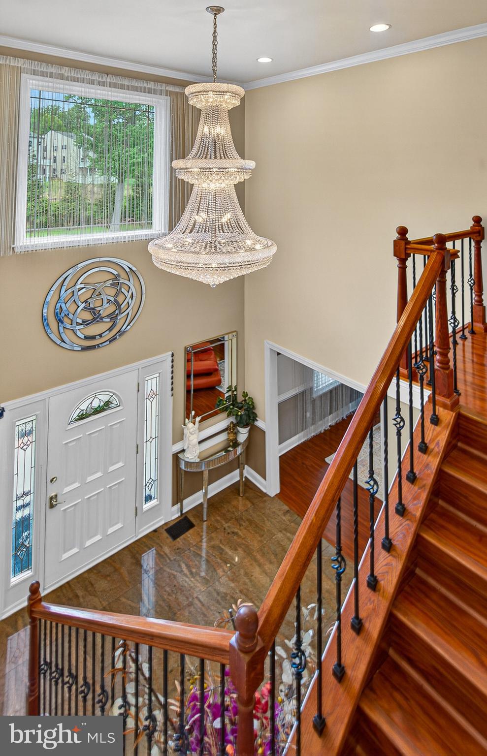 4603 Lathe Road Owings Mills, MD 21117 - Photo 13 of 86 TWO LEVELS FOYER WITH CRYSTAL THREE-TEAR CHANDELIE