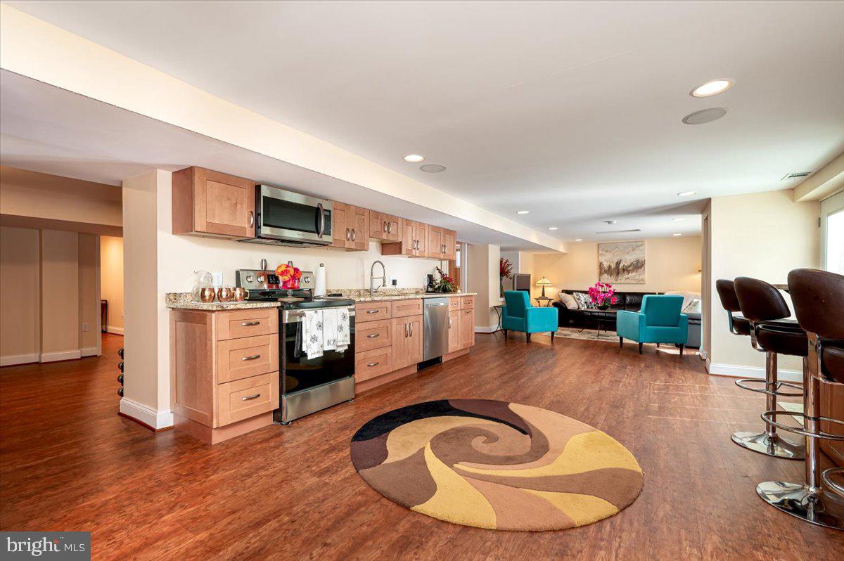 4603 Lathe Road Owings Mills, MD 21117 - Photo 52 of 86 a living room with furniture and a wooden floor