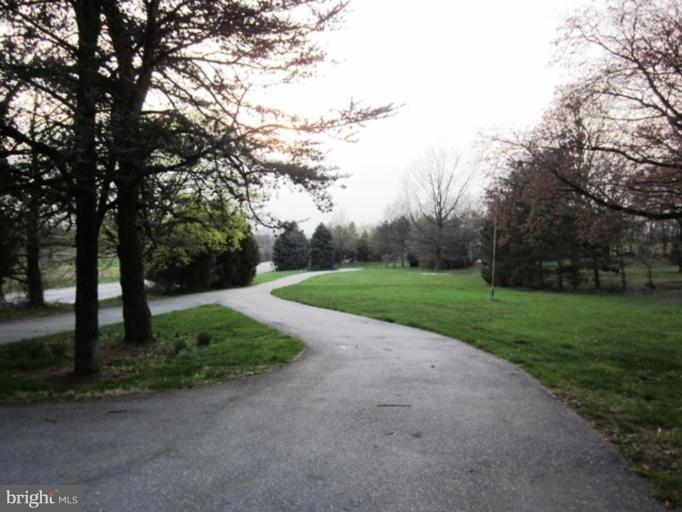 15302 Liberty Road Mount Airy, MD 21771 - Photo 10 of 13 long, paved circle driveway with plenty of parking