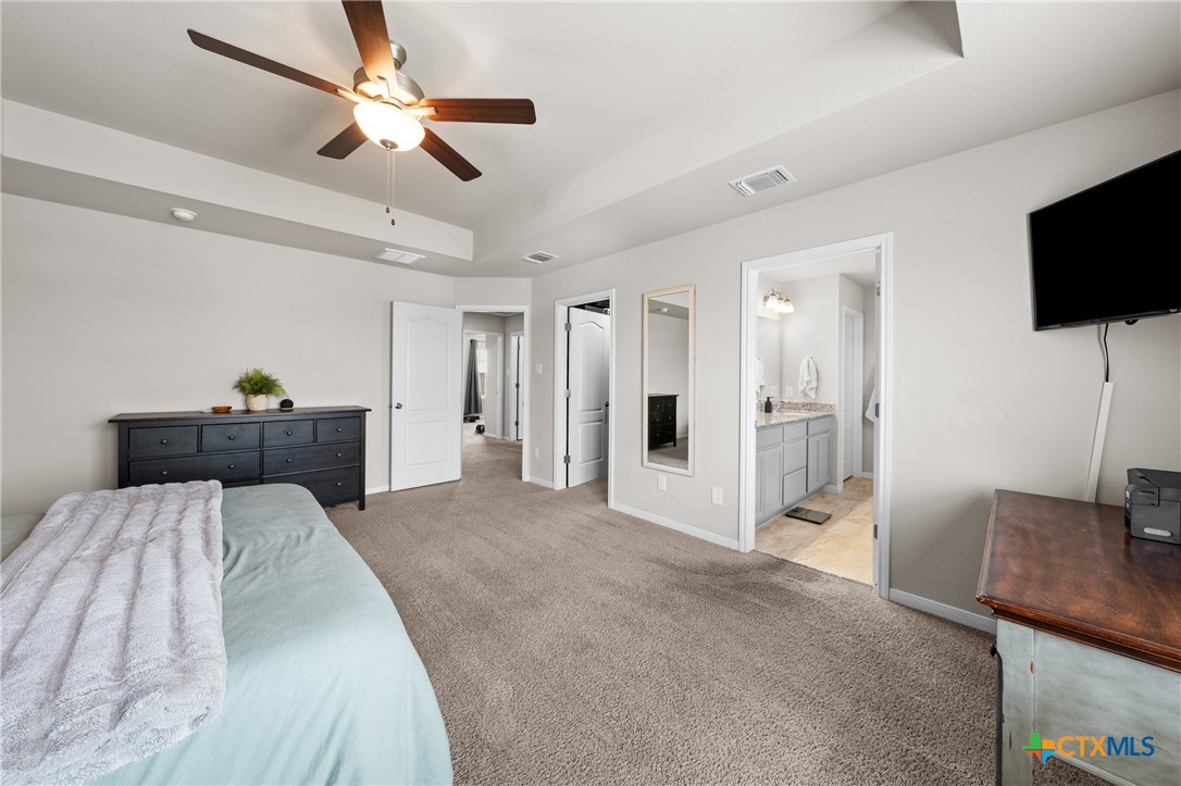 7468 Mossy Ridge Lane Temple, TX 76502 - Photo 19 of 38 a view of a livingroom with a flat screen tv