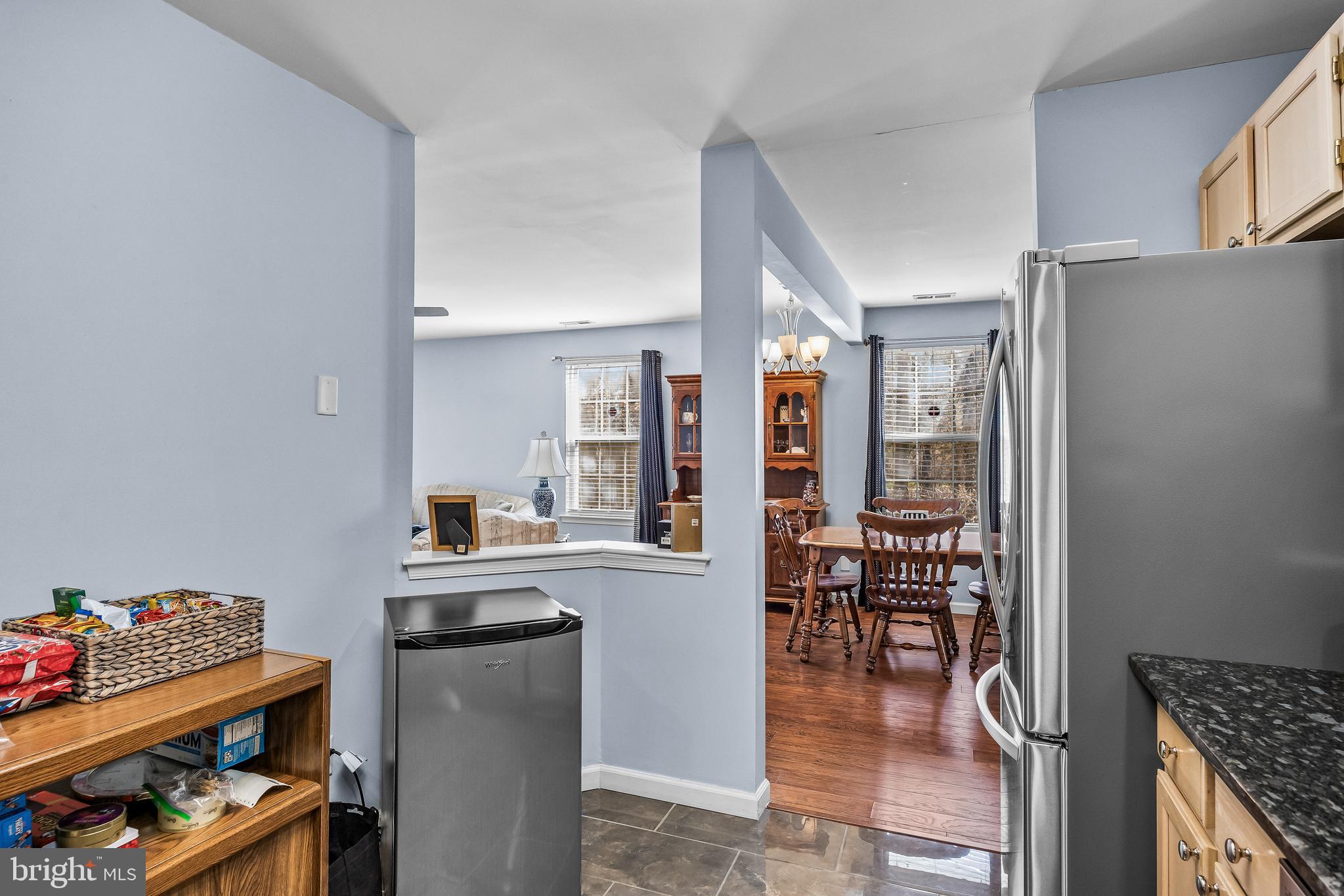 203 Quail Road Marlton, NJ 08053 - Photo 12 of 27 a dining room with furniture and wooden floor