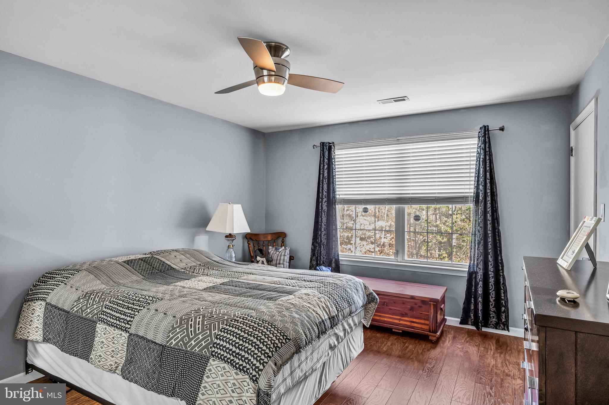 203 Quail Road Marlton, NJ 08053 - Photo 13 of 27 a bedroom with a bed and a window