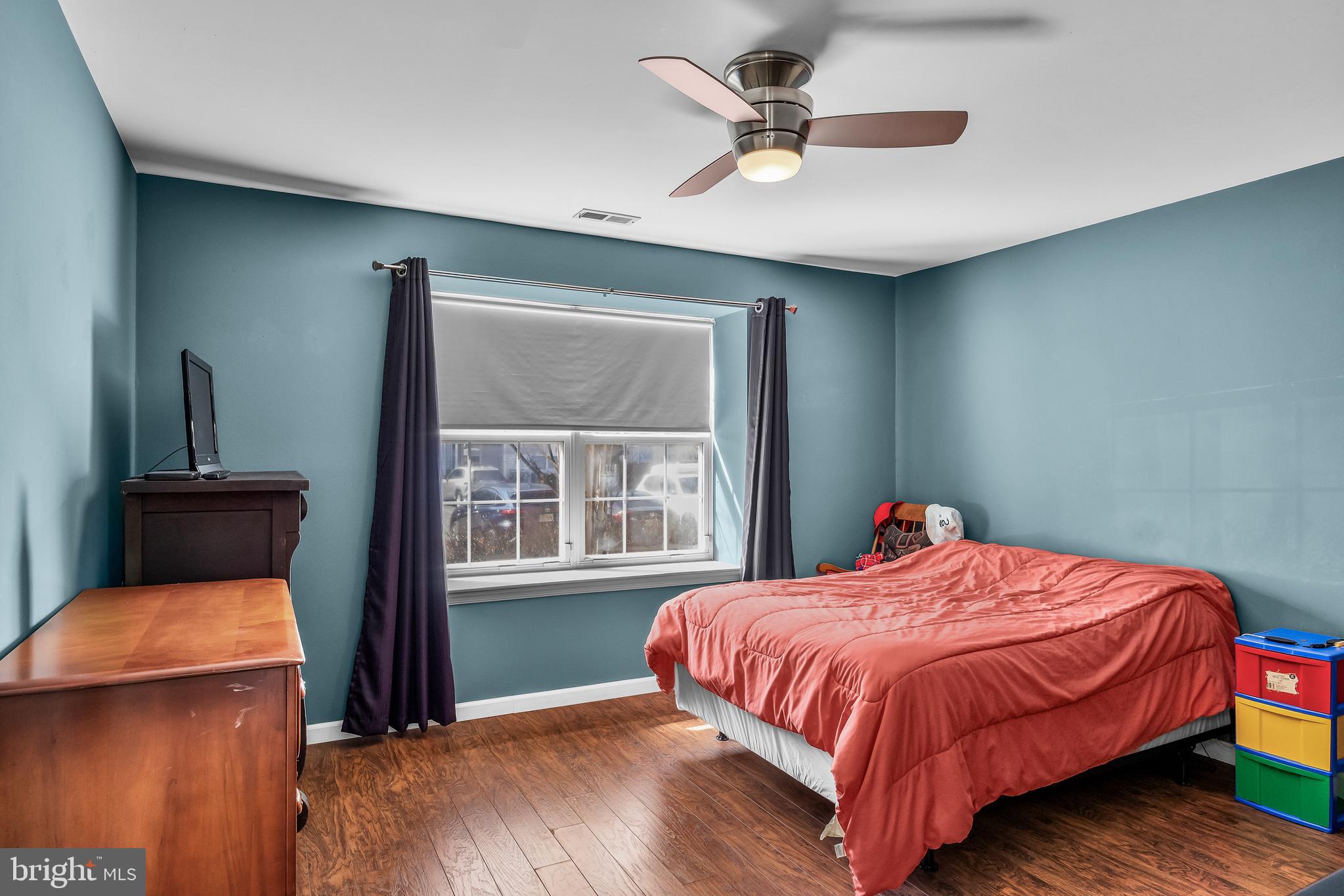 203 Quail Road Marlton, NJ 08053 - Photo 17 of 27 a bedroom with a bed and a window