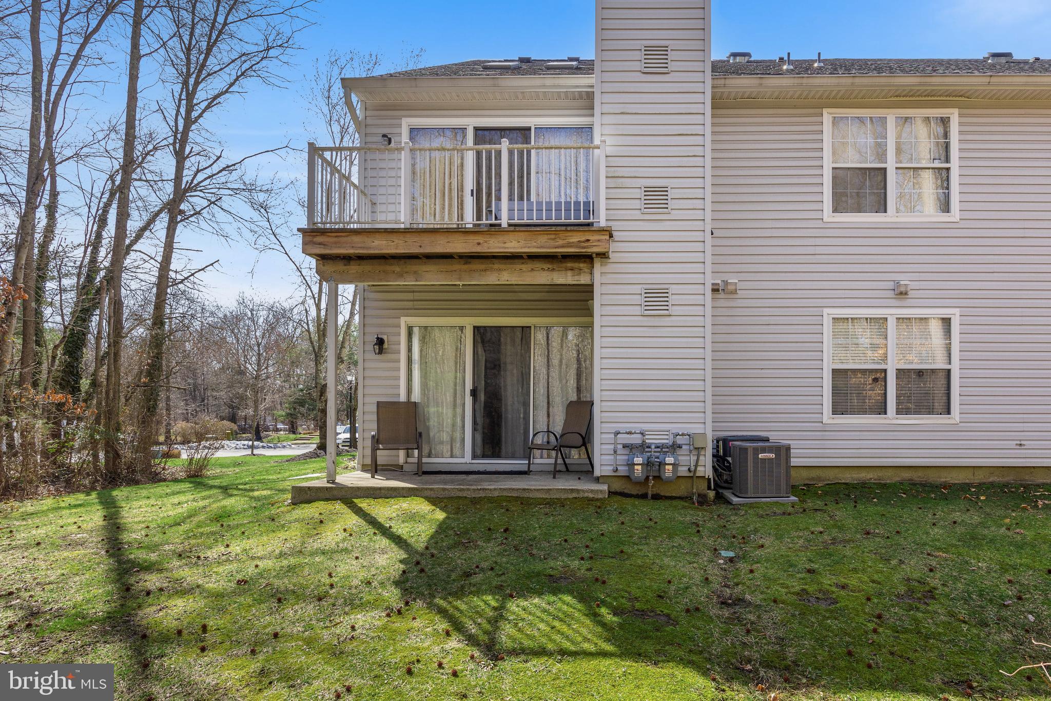 203 Quail Road Marlton, NJ 08053 - Photo 19 of 27 a view of a house with backyard and garden