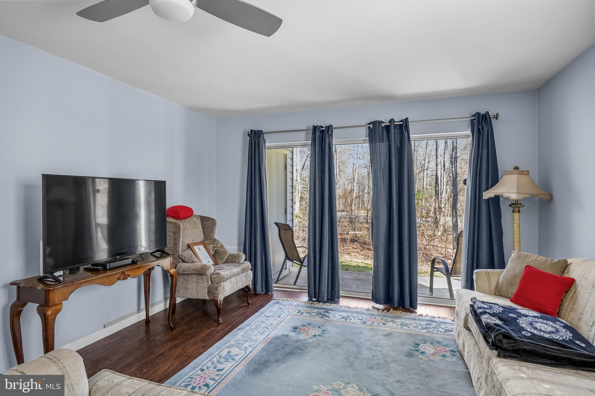 203 Quail Road Marlton, NJ 08053 - Photo 6 of 27 a living room with furniture and a flat screen tv