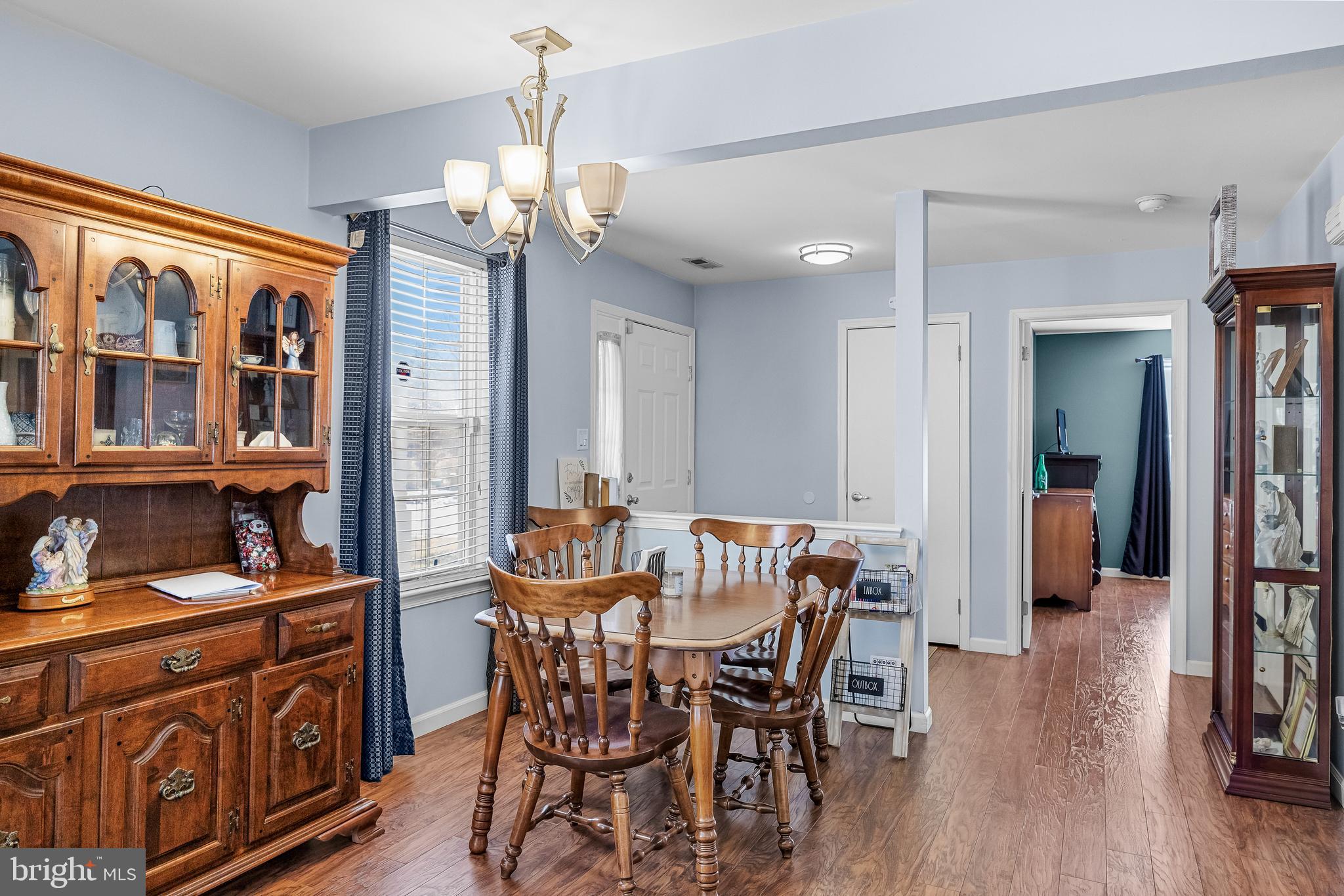 203 Quail Road Marlton, NJ 08053 - Photo 8 of 27 a view of a dining room with furniture window and wooden floor