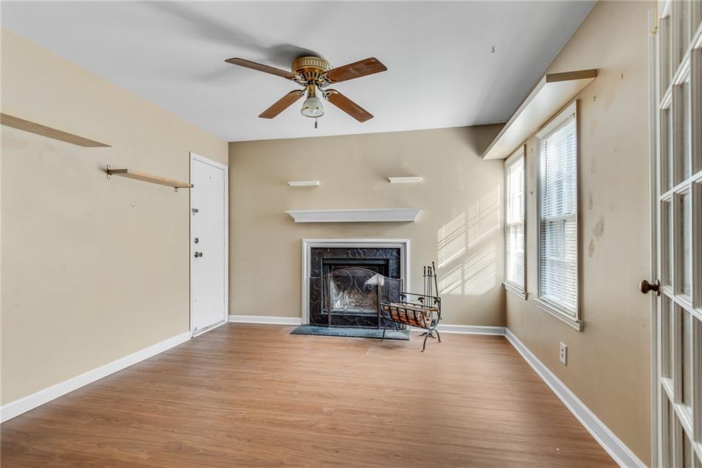 134 Lablanc Way Northwest Atlanta, GA 30327 - Photo 10 of 42 a view of a livingroom with a fireplace and window
