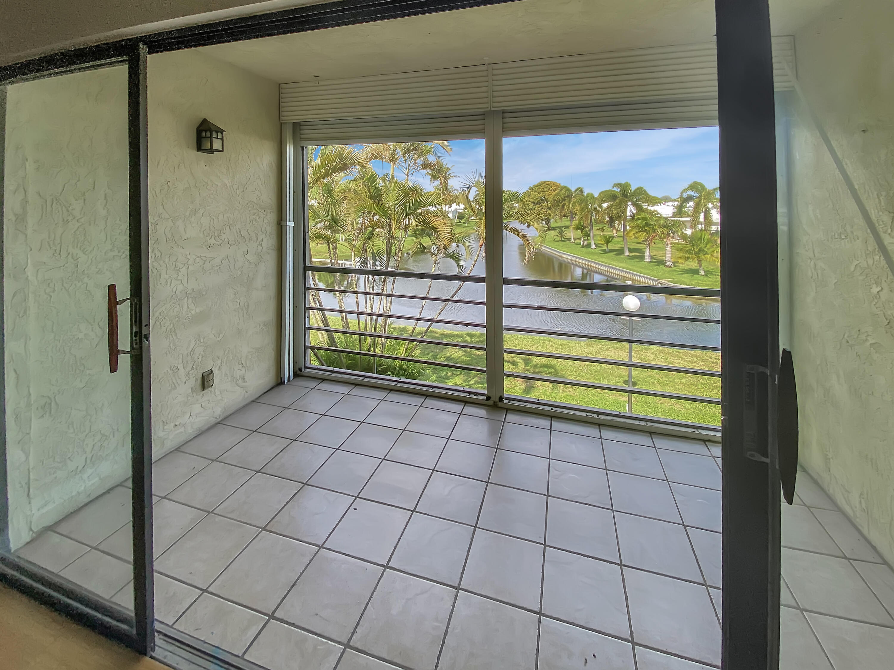 1981 Woolbright Road, Unit E206 Boynton Beach, FL 33426 - Photo 18 of 29 1981 W Woolbright Rd E206 - Patio