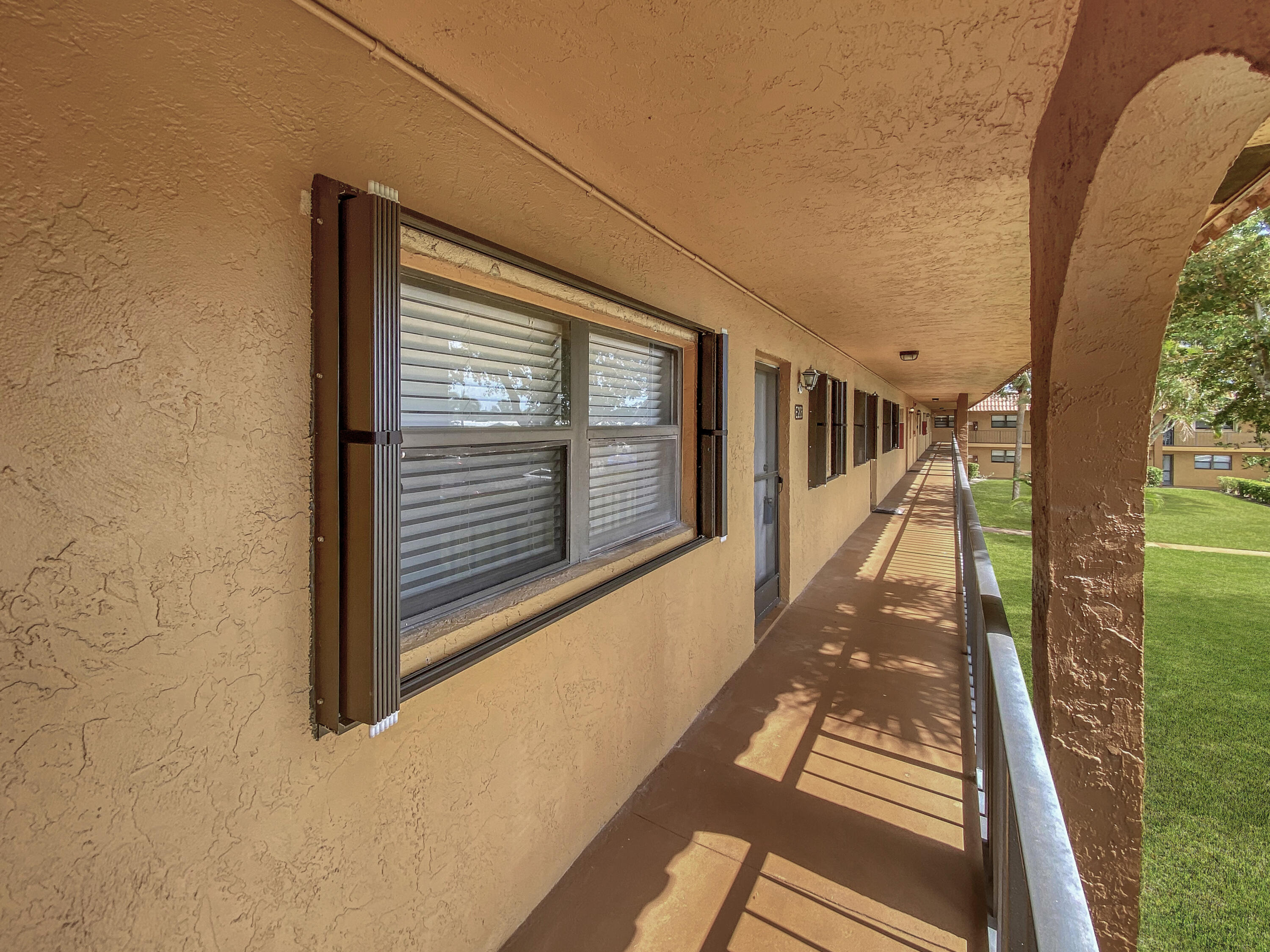 1981 Woolbright Road, Unit E206 Boynton Beach, FL 33426 - Photo 21 of 29 1981 W Woolbright Rd E206 - Hallway