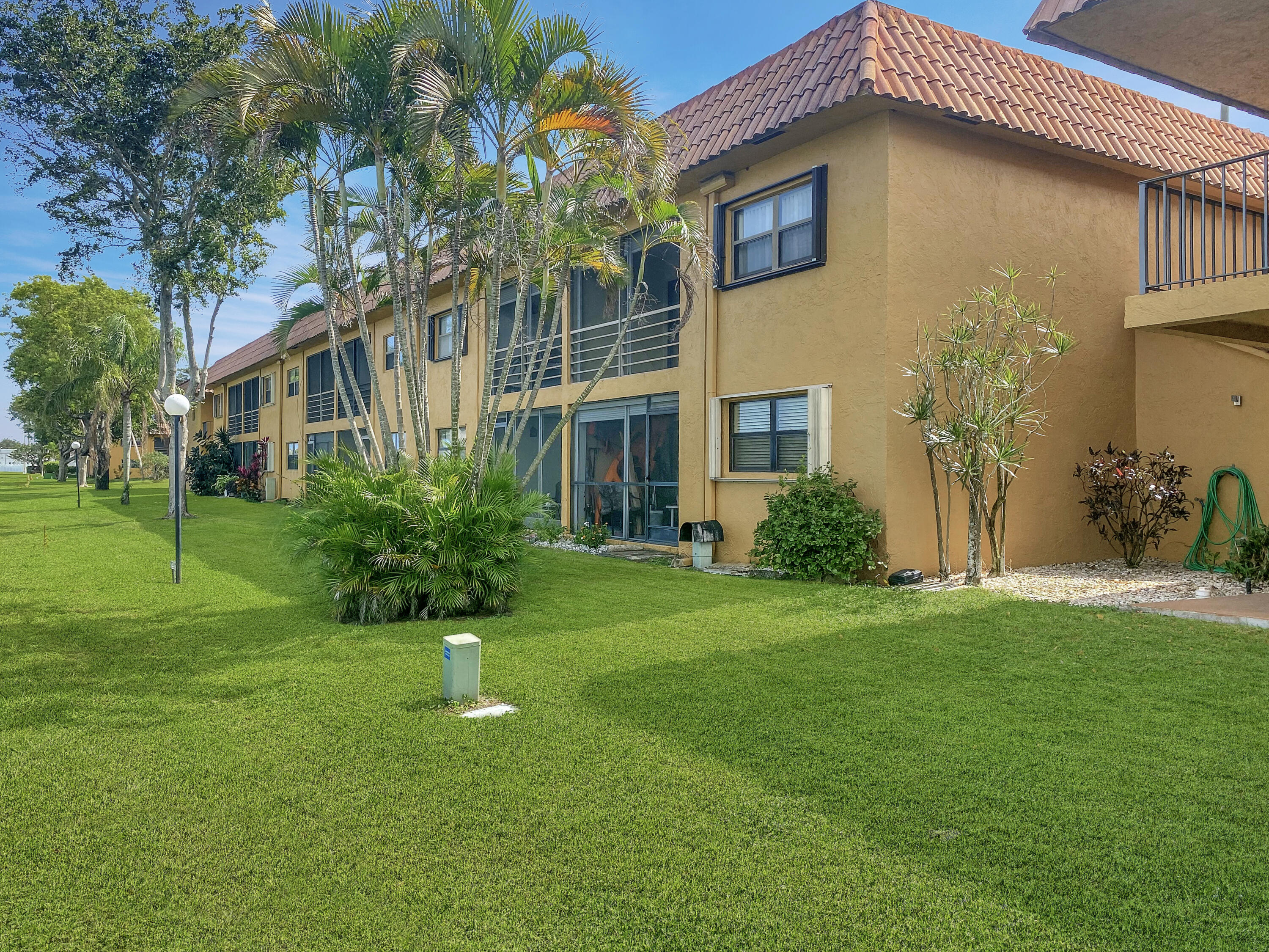 1981 Woolbright Road, Unit E206 Boynton Beach, FL 33426 - Photo 23 of 29 1981 W Woolbright Rd E206 - Back View o