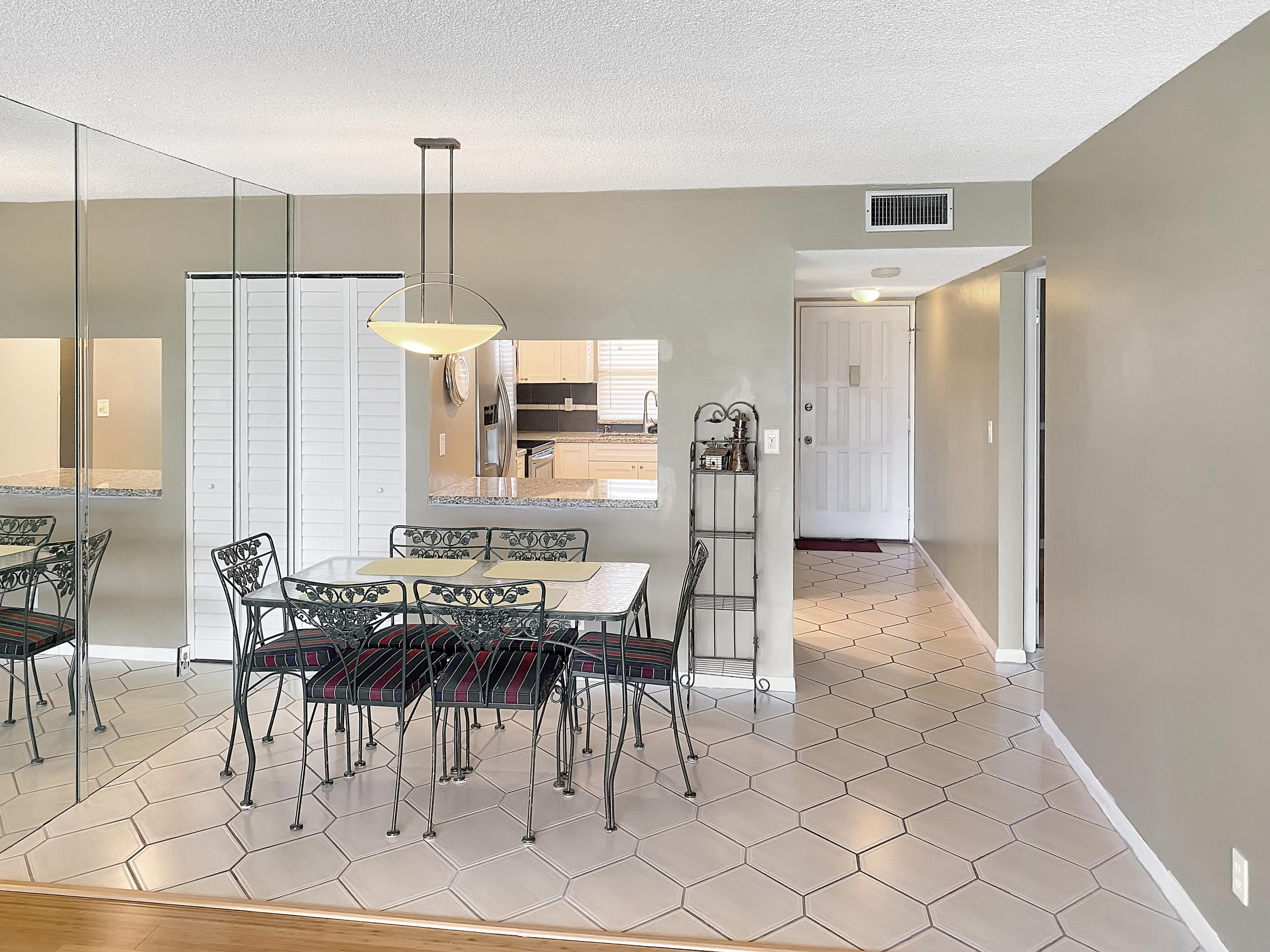1981 Woolbright Road, Unit E206 Boynton Beach, FL 33426 - Photo 8 of 29 1981 W Woolbright Rd E206 - Dining and K
