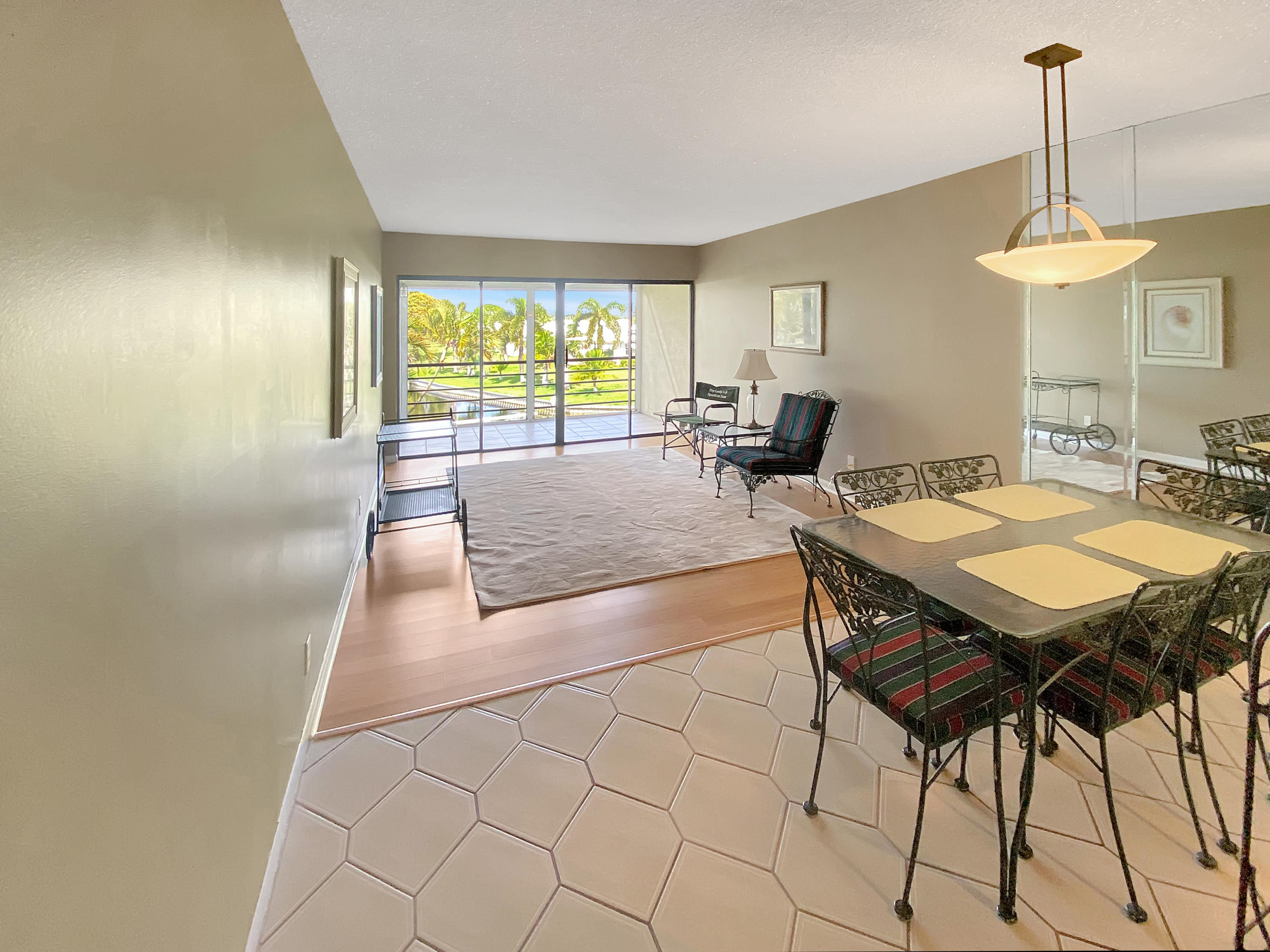 1981 Woolbright Road, Unit E206 Boynton Beach, FL 33426 - Photo 9 of 29 1981 W Woolbright Rd E206 - Dining and L