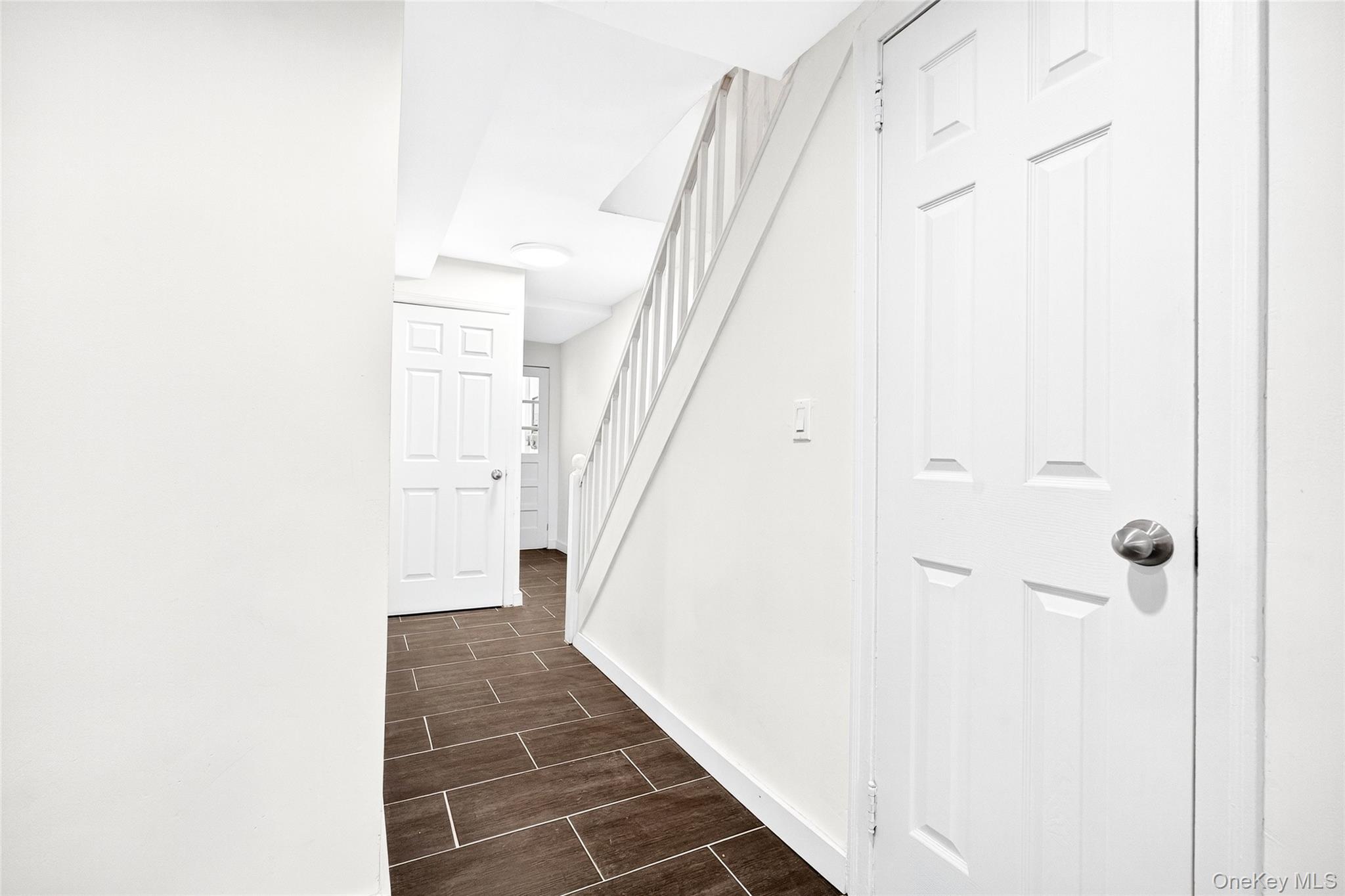 1458 Rowland Street Bronx, NY 10461 - Photo 23 of 49 Hall featuring wood finish floors and stairway