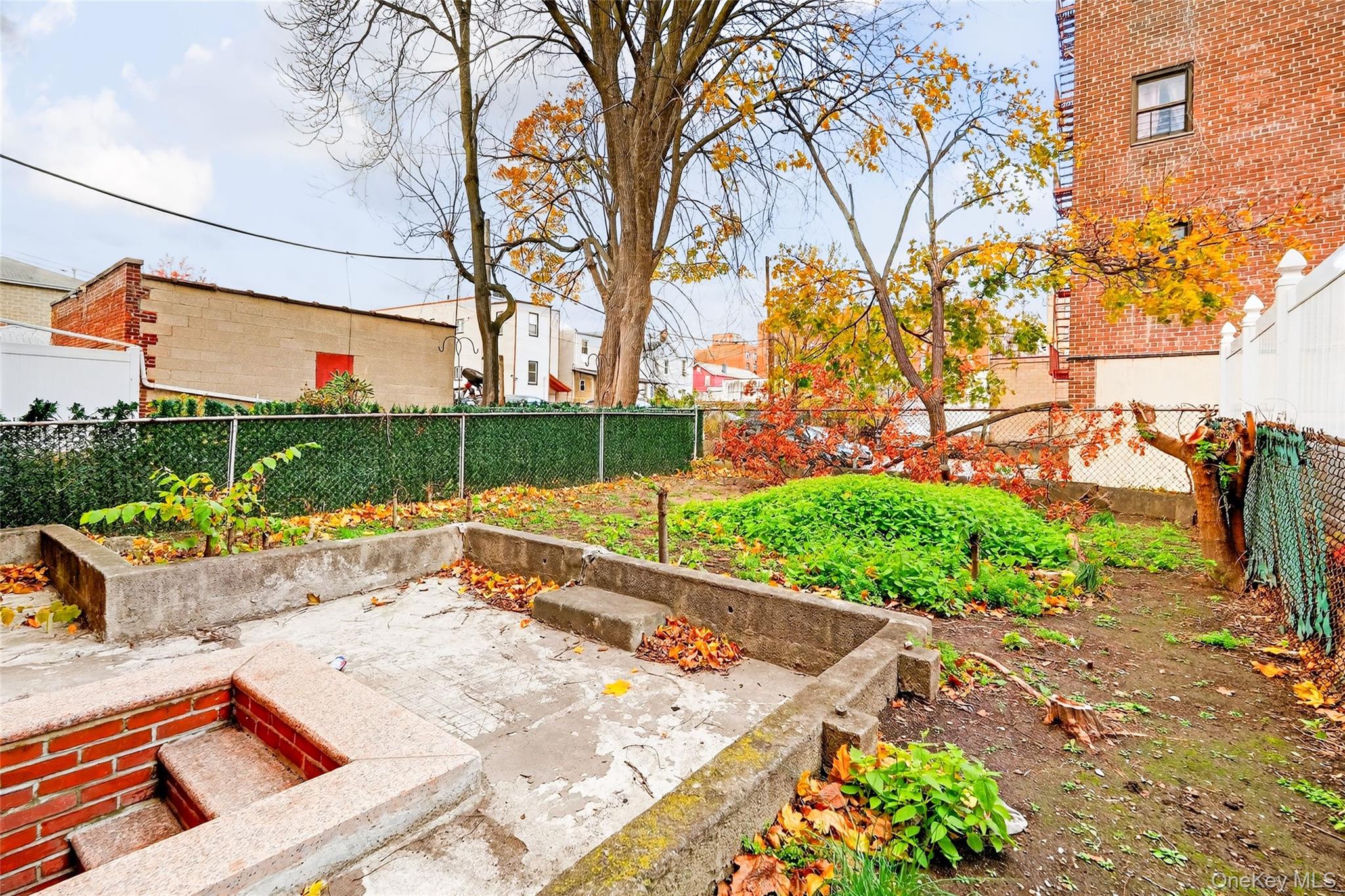 1458 Rowland Street Bronx, NY 10461 - Photo 46 of 49 Fenced backyard featuring a patio area