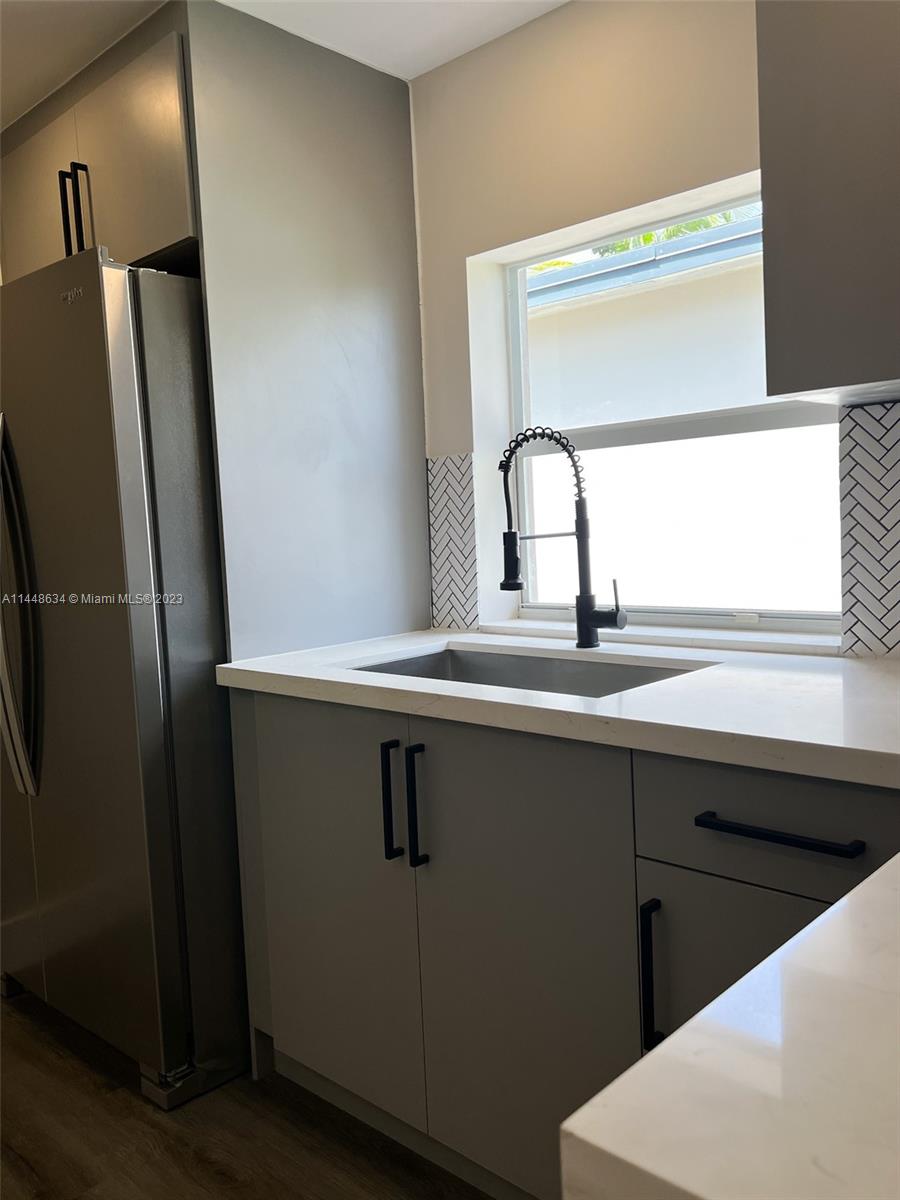 Pinewood Miami, FL 33167 - Photo 11 of 31 a close view of sink and mirror