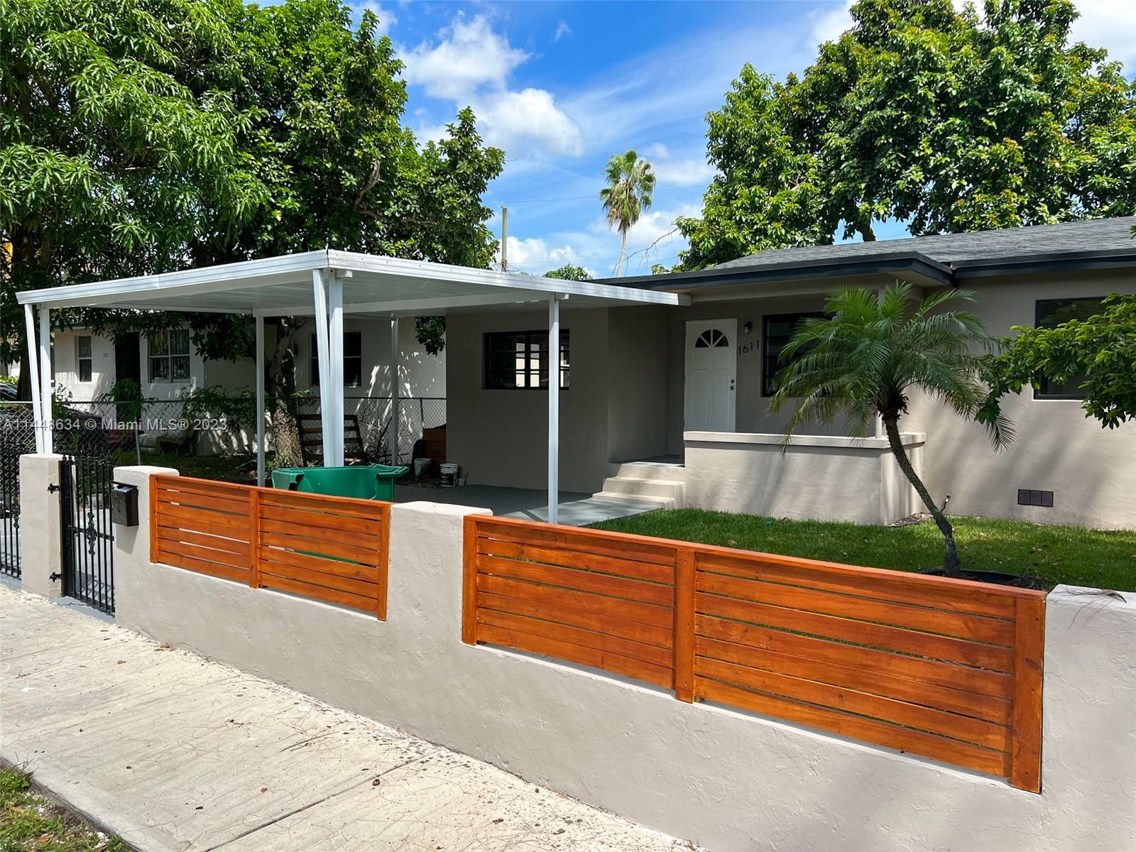 Pinewood Miami, FL 33167 - Photo 2 of 31 swimming pool view with a seating space