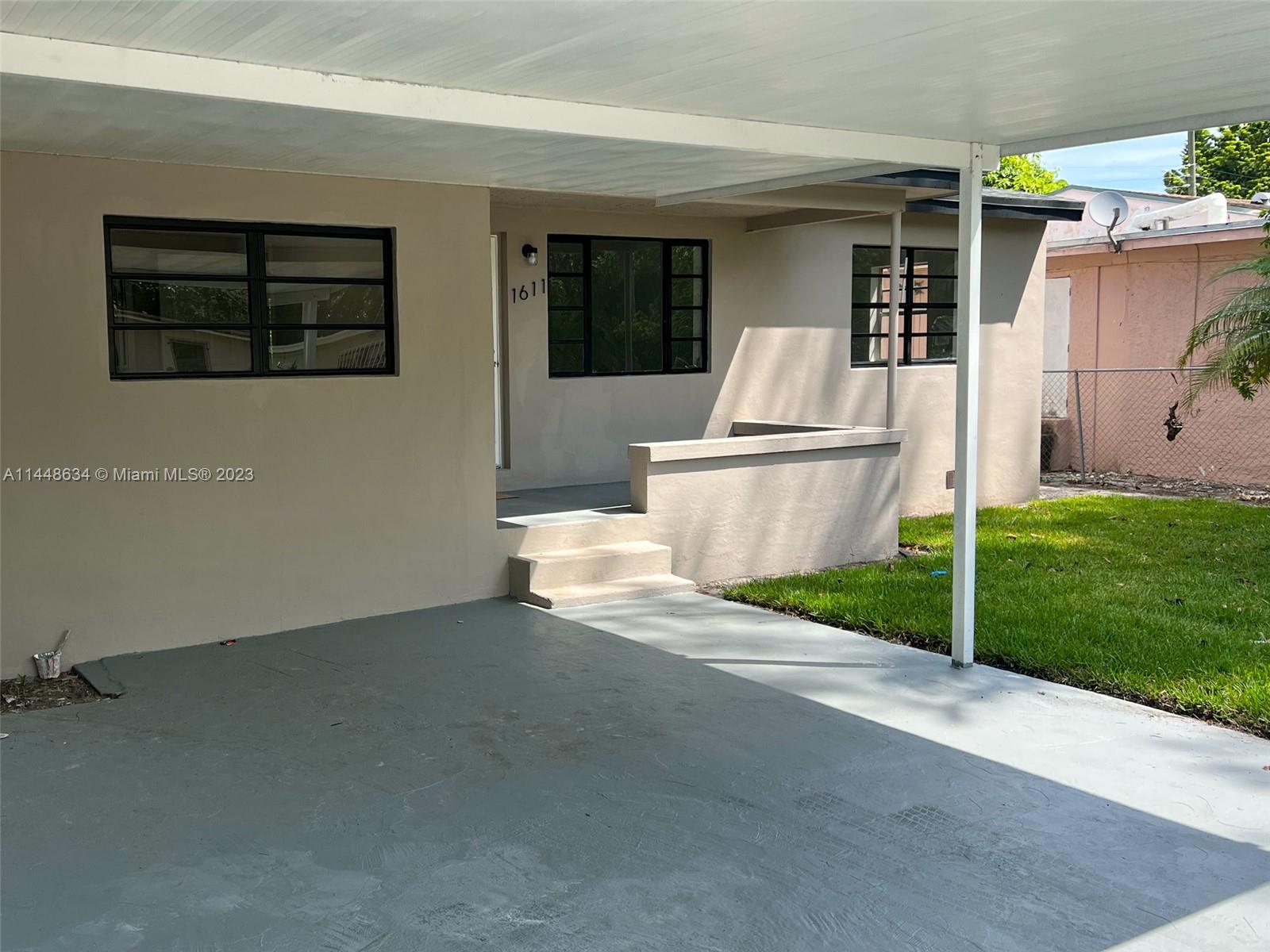 Pinewood Miami, FL 33167 - Photo 6 of 31 a view of back yard of the house