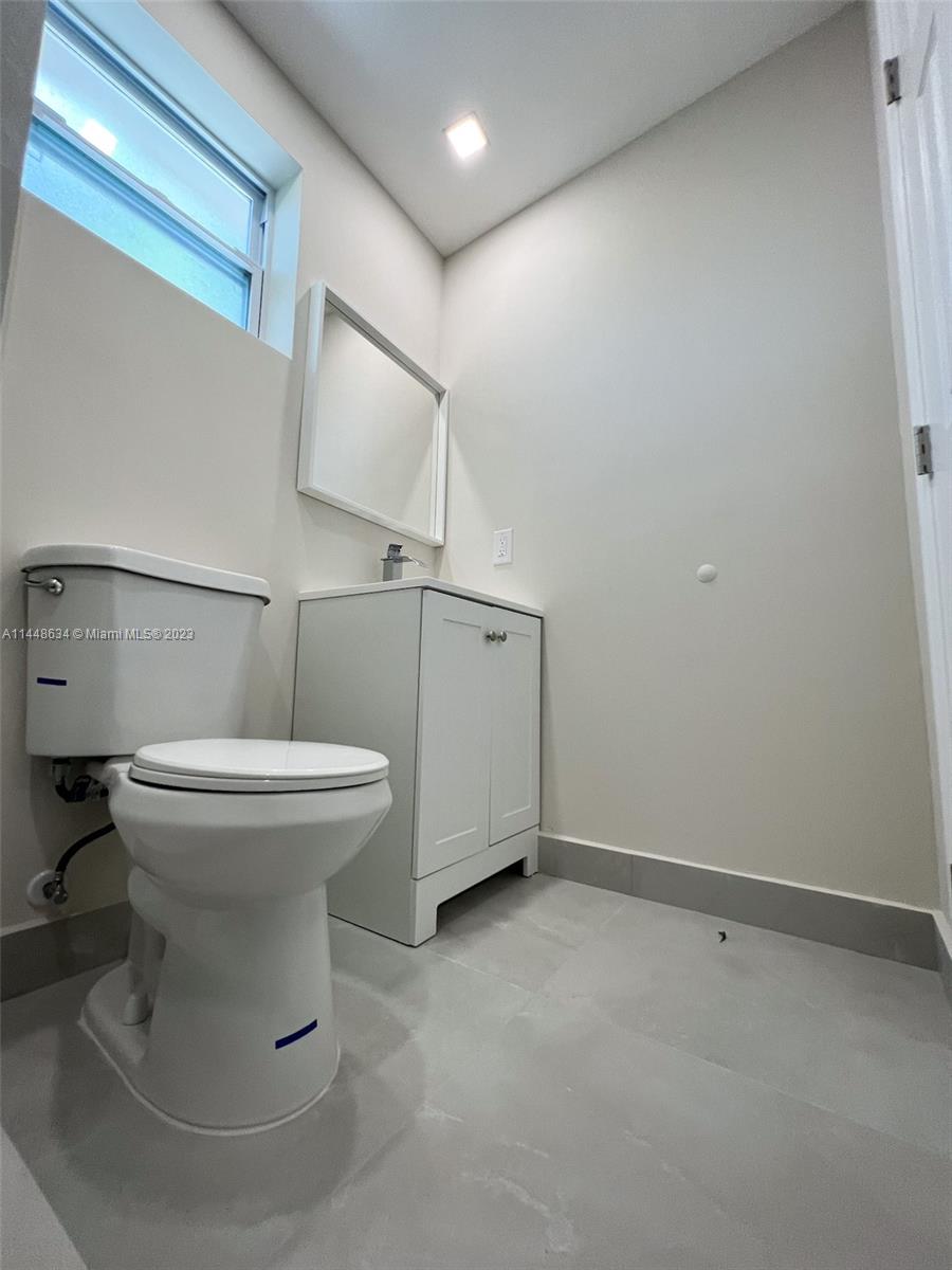 Pinewood Miami, FL 33167 - Photo 8 of 31 a view of bathroom with toilet