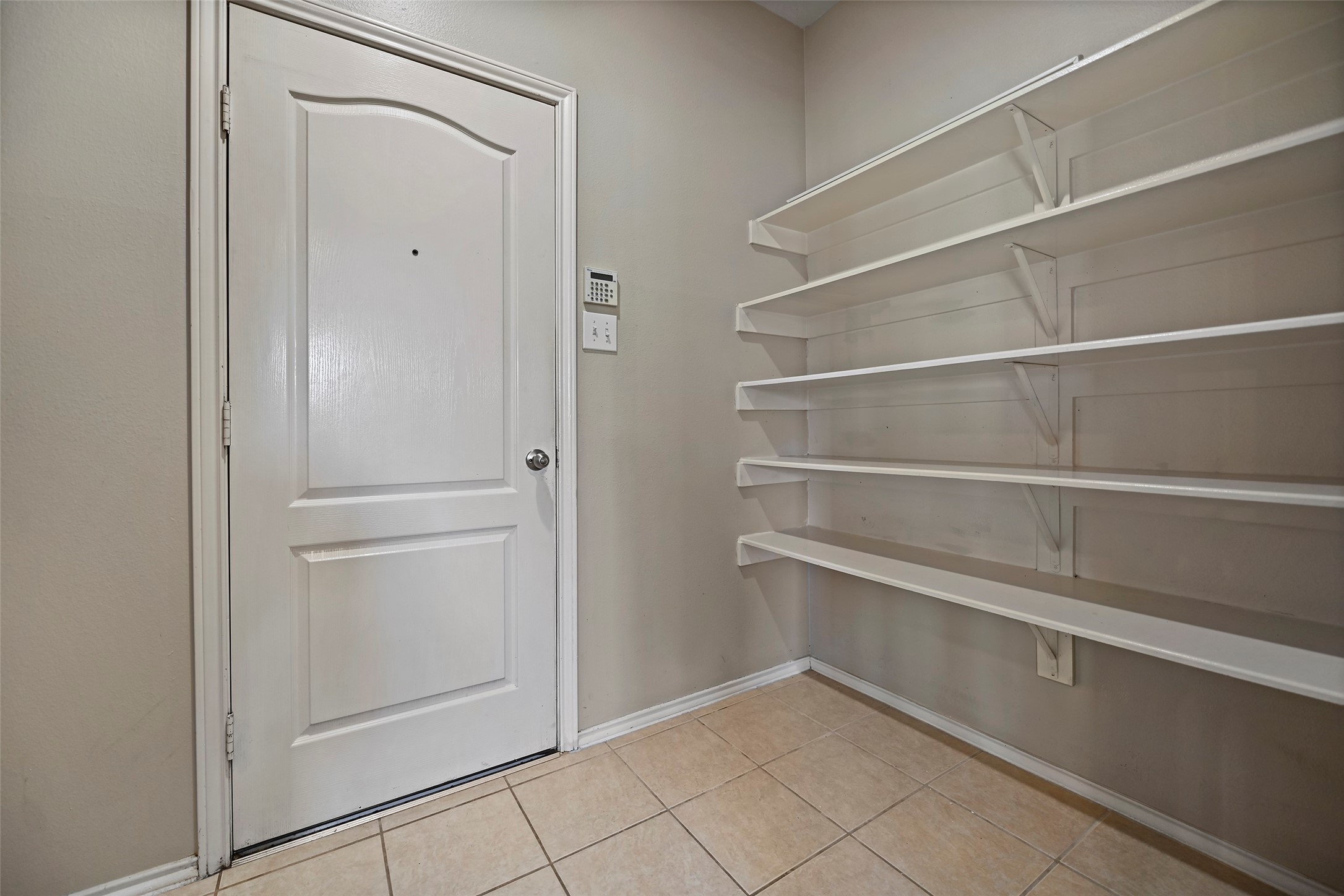 20739 Stewart Crest Lane Cypress, TX 77433 - Photo 11 of 35 a view of walk in closet with empty racks