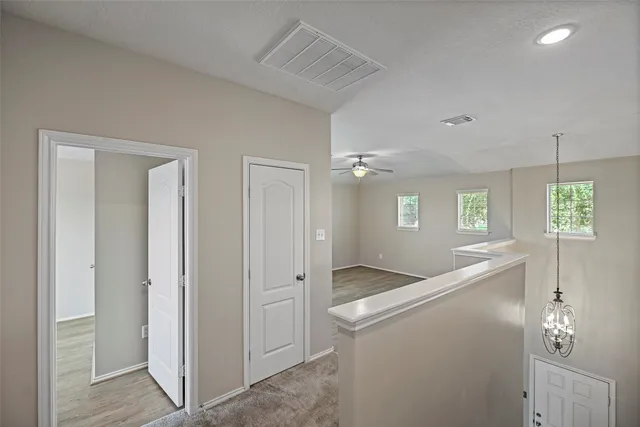 a kitchen with granite countertop a refrigerator and a sink