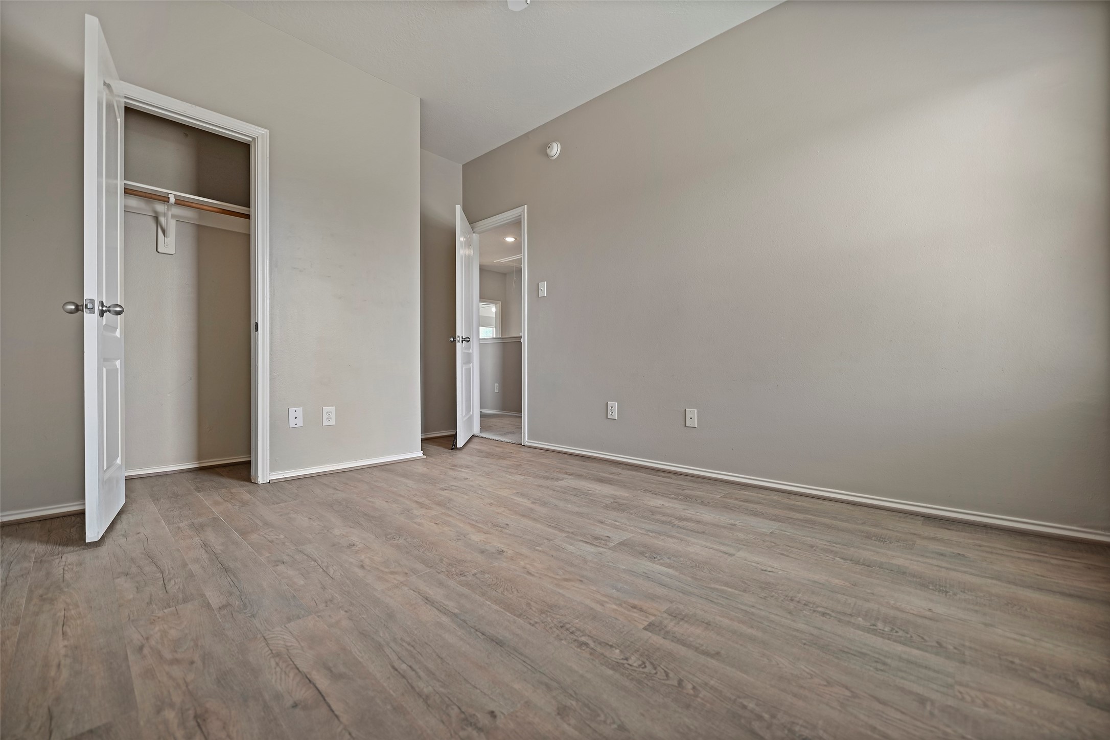 20739 Stewart Crest Lane Cypress, TX 77433 - Photo 18 of 35 a view of an empty room with wooden floor and closet