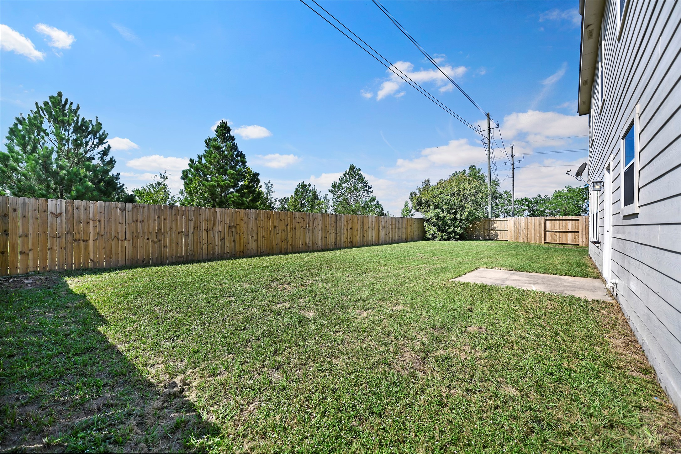 20739 Stewart Crest Lane Cypress, TX 77433 - Photo 35 of 35 a view of yard with swimming pool and wooden fence