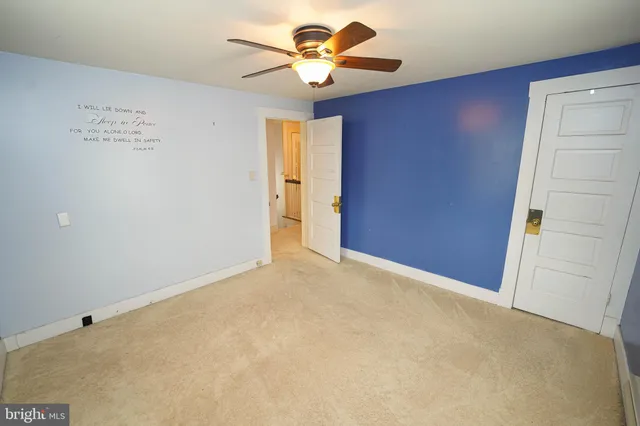 a bathroom with a toilet and a sink